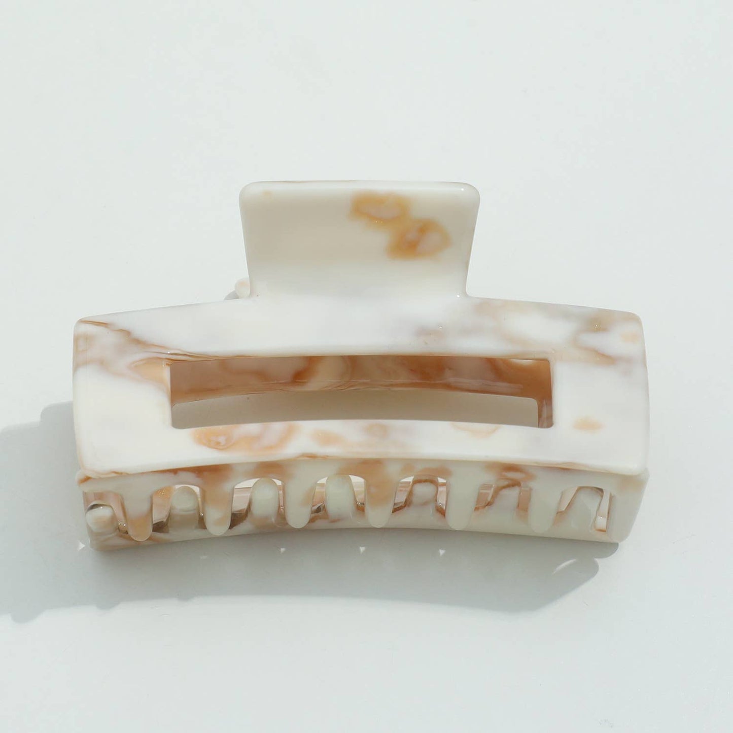 THE CALACATTA GOLD CLAW CLIPS