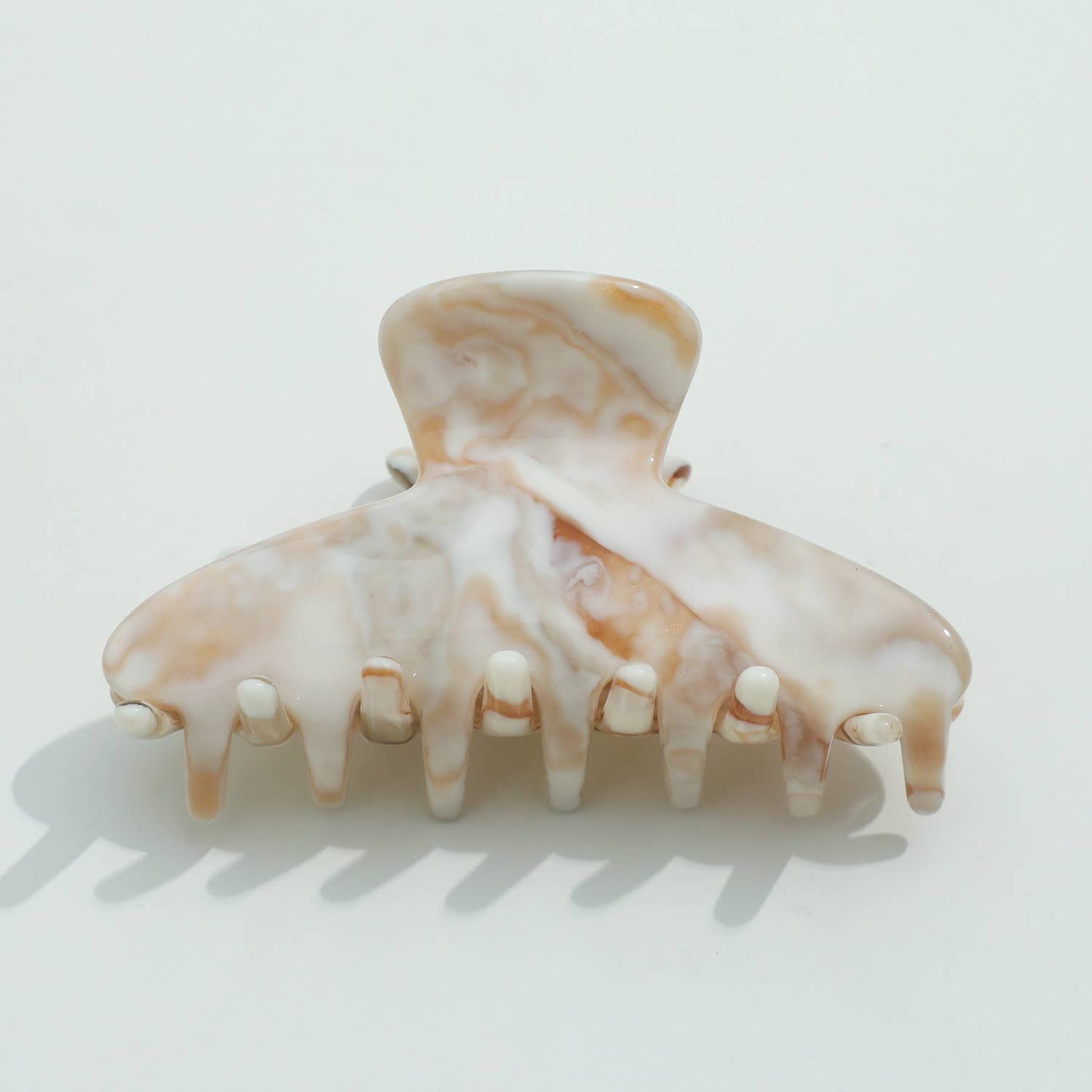 THE CALACATTA GOLD CLAW CLIPS