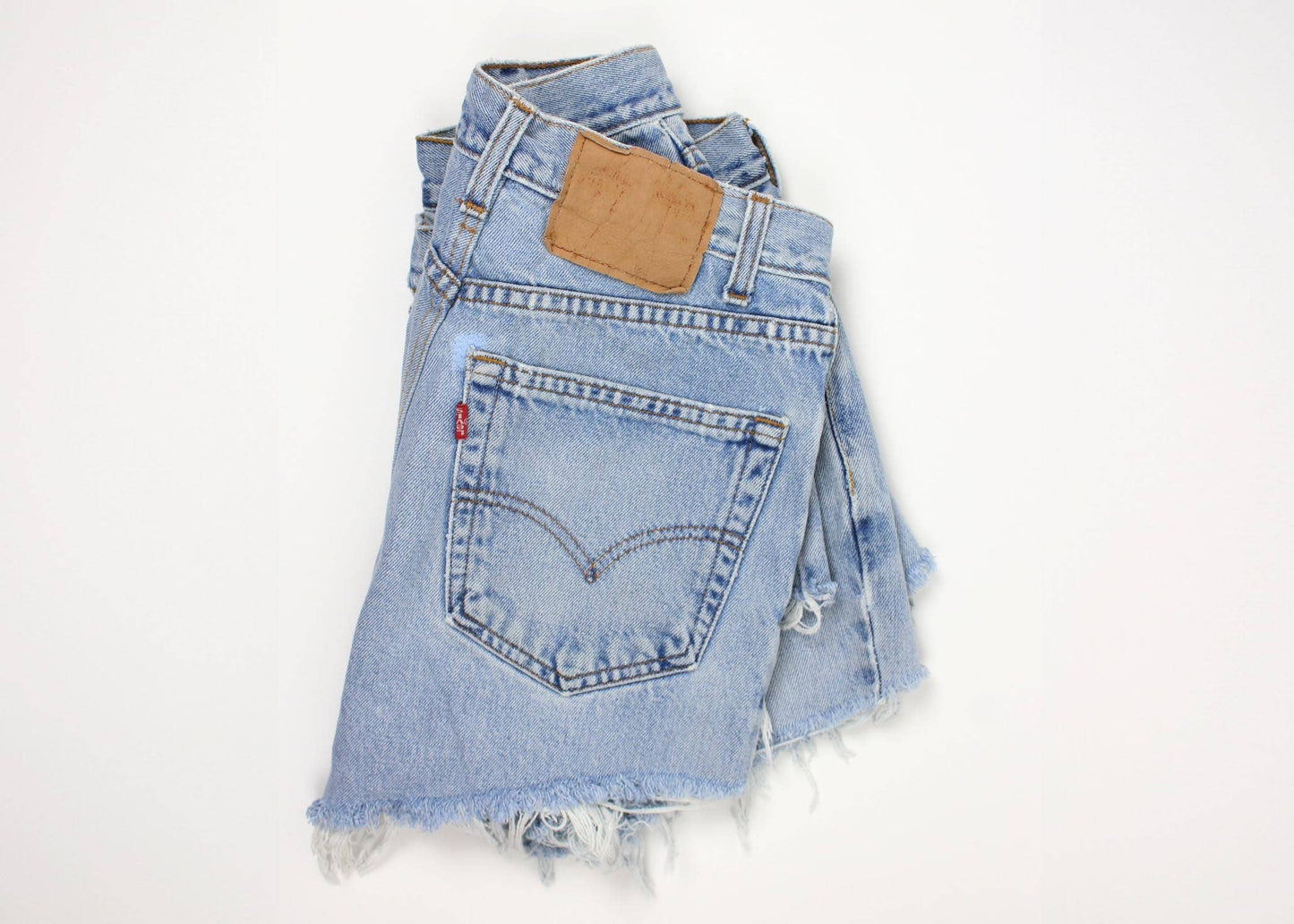 THE HIGH-RISE UPCYCLED DENIM CUTOFFS