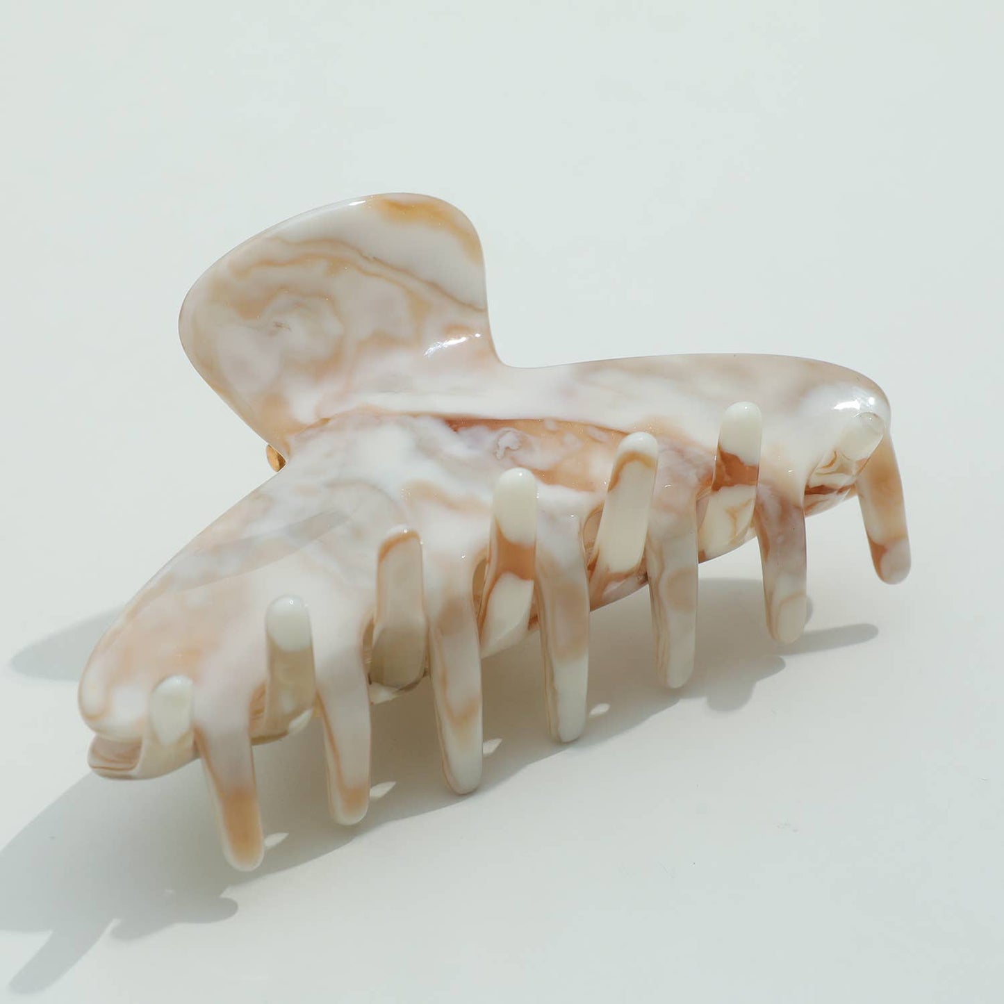 THE CALACATTA GOLD CLAW CLIPS